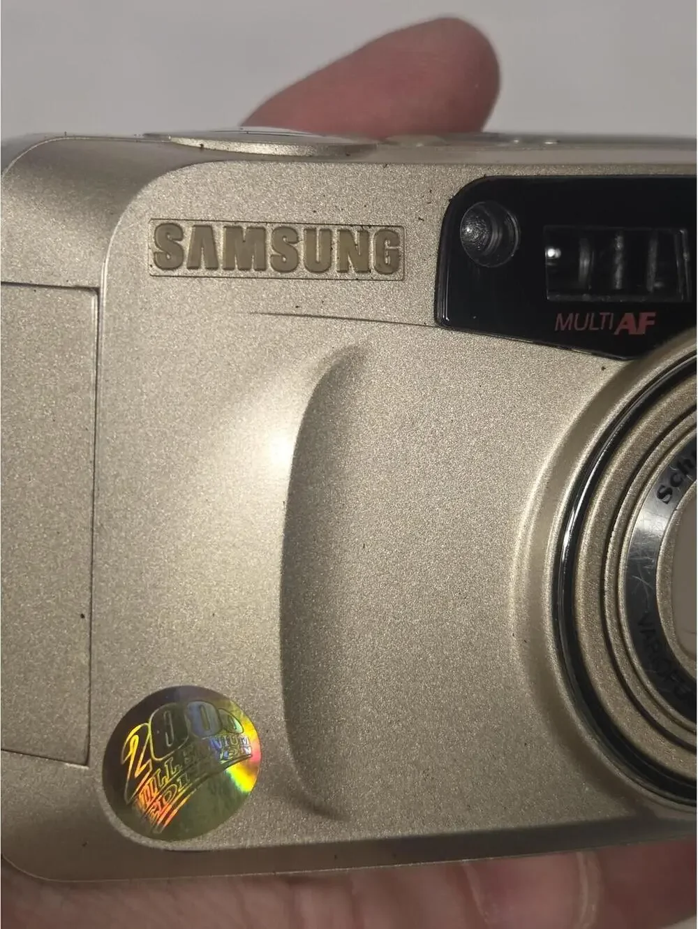 Vintage Samsung Evoca 140S Quartz Date 35mm Film Camera Gold Flash Point Shoot